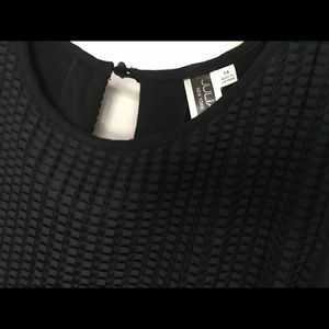 Little black dress. Size 14. Ridged top.